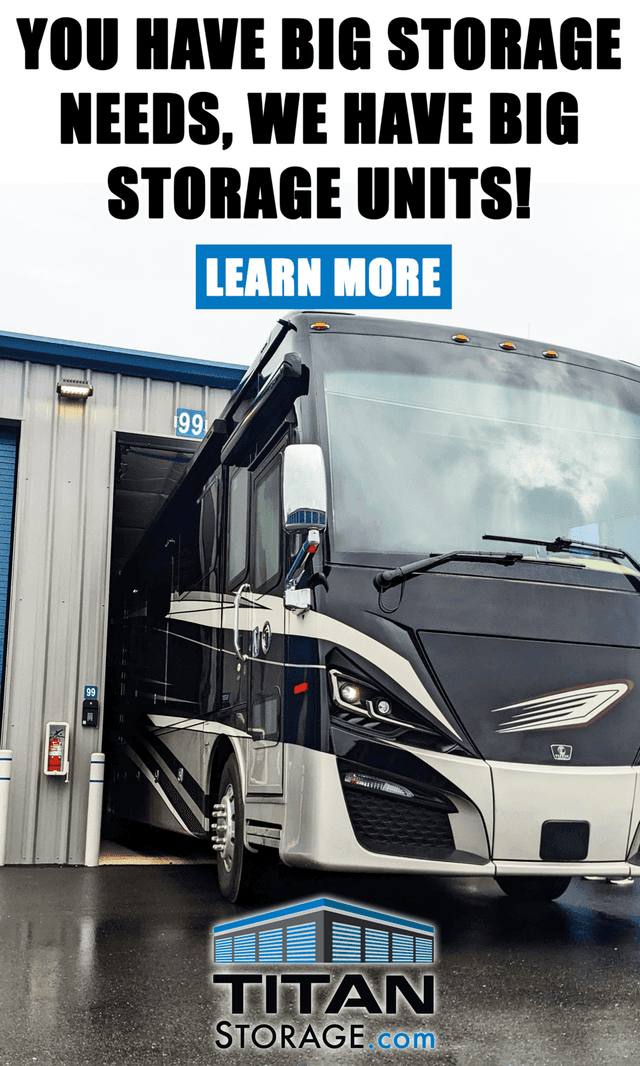 Climate Controlled 15’x50’ storage unit in Spanish Fort AL with a 42-foot Tiffin motorhome coach RV backing into it through the 14’ tall 12’ wide overhead door