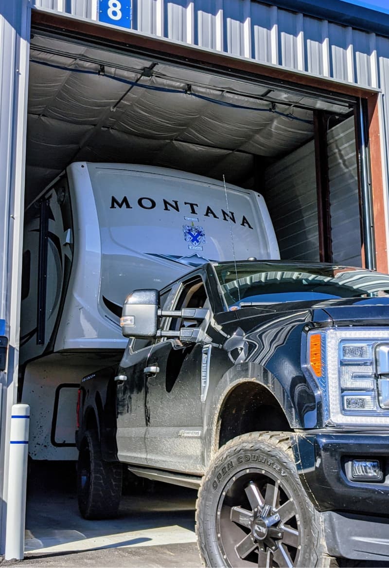 42ft 5th wheel camper / travel trailer backing into a 50 foot deep indoor parking unit with electric and temperature control