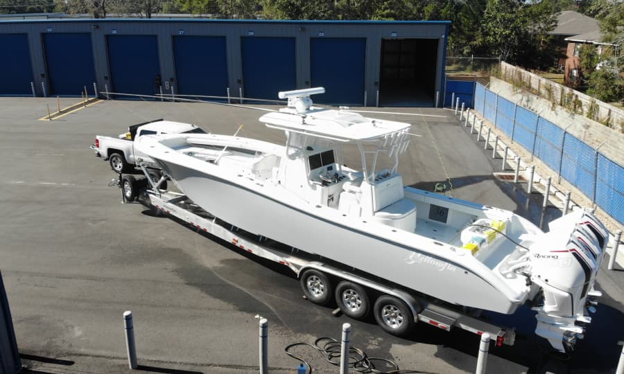 Boat using washdown area Spanish Fort Titan Storage