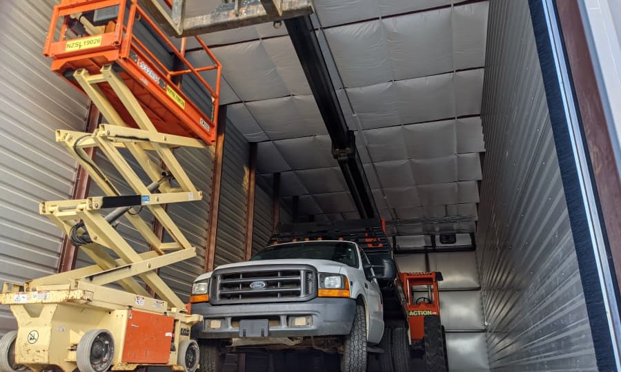 Large construction business equipment vehicles in Spanish Fort Titan Storage